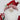 Santa gnome in cotton jacket holding presents and candy cane