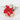 Decorative Red floral arrangements in a wooden pot