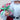 Santa Claus holding presents and bell